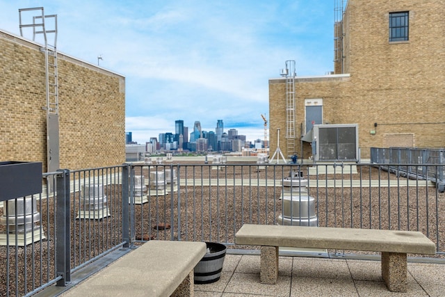 2929 Chicago Ave Unit 1216, Minneapolis, MN 55407 - patio / terrace with a view of skyline