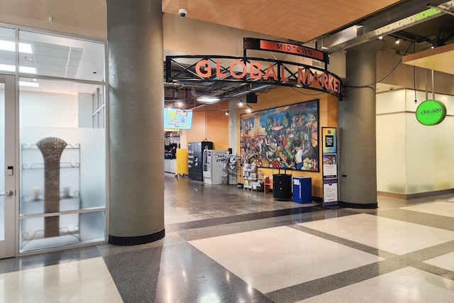 2929 Chicago Ave Unit 1216, Minneapolis, MN 55407 - community lobby featuring a surveillance system and a high ceiling