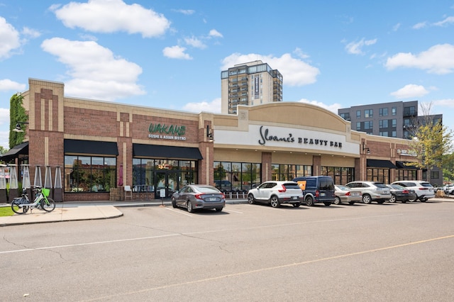 3054 Lake Shore Dr Unit B, Minneapolis, MN 55416 - view of building exterior featuring uncovered parking