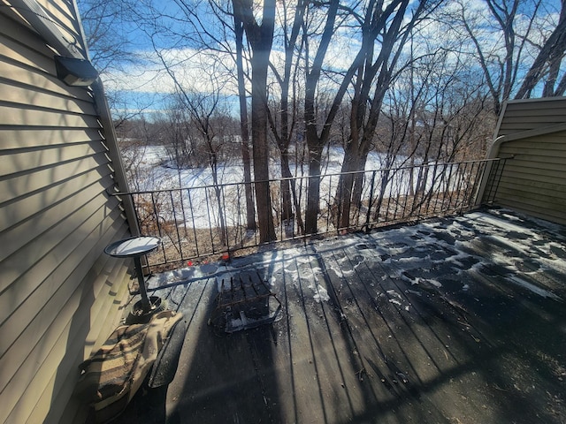 view of snow covered deck