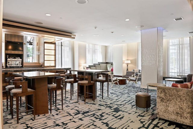 201 11th St Unit 1140, Minneapolis, MN 55403 - bar with light colored carpet, recessed lighting, and visible vents