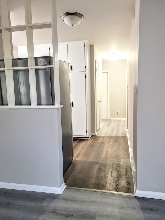 hallway featuring hardwood / wood-style floors