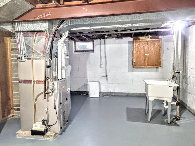 basement featuring heating unit