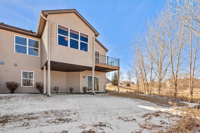 view of snow covered house