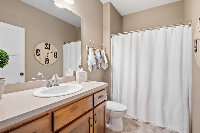 full bathroom with vanity, curtained shower, and toilet