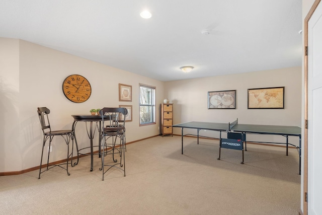 playroom featuring baseboards and carpet floors