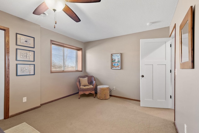 unfurnished room with baseboards, carpet, and ceiling fan