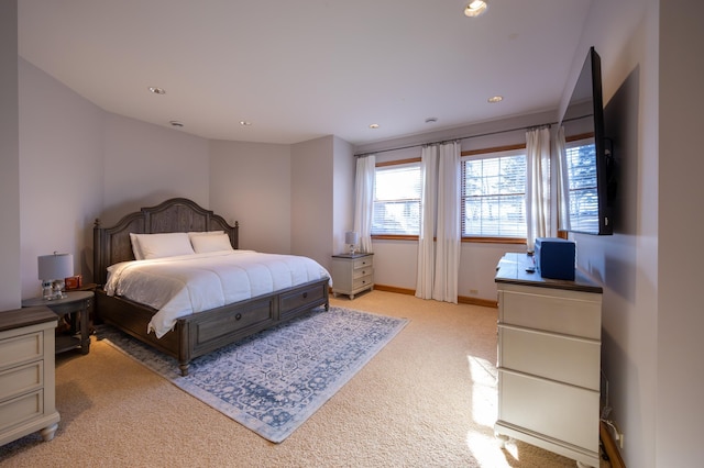 bedroom with light carpet