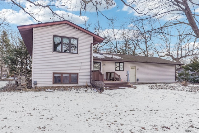 view of snow covered house