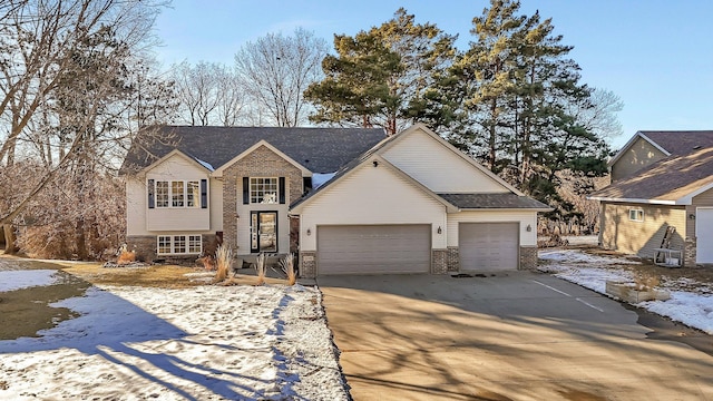 view of front of property with a garage