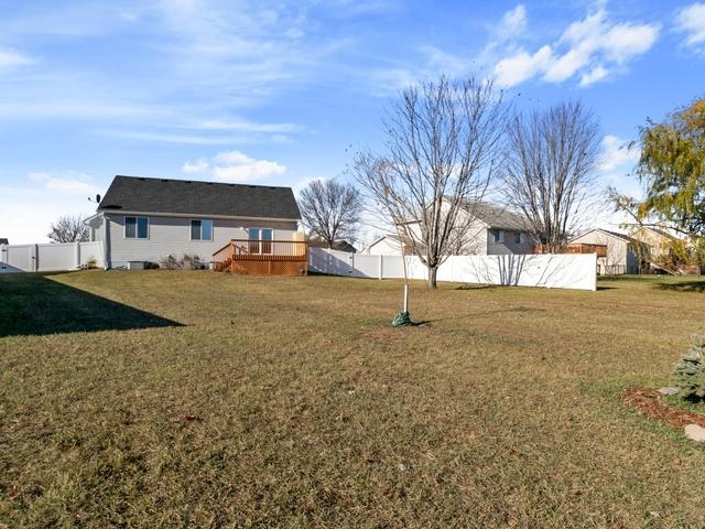 view of yard featuring a wooden deck