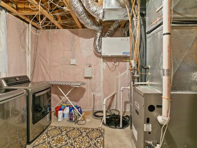 laundry area with laundry area and washer and dryer