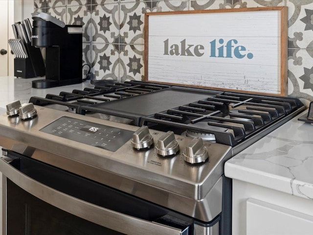 interior details featuring decorative backsplash