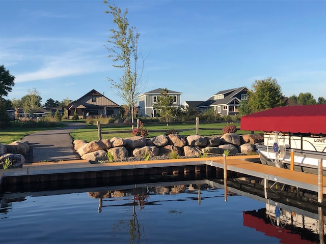 dock area with a water view