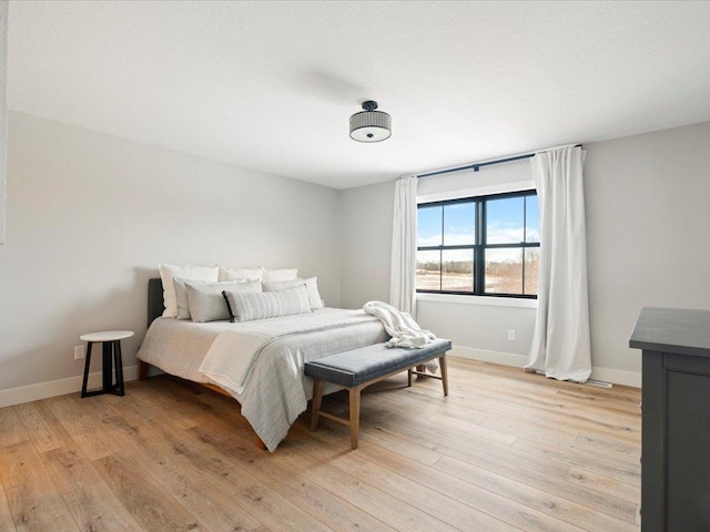 bedroom featuring light hardwood / wood-style flooring