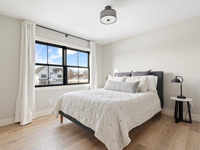 bedroom featuring light hardwood / wood-style flooring