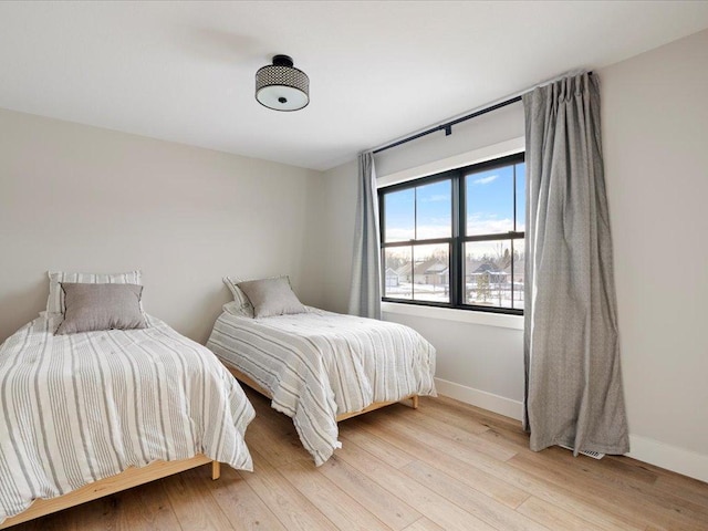 bedroom featuring light hardwood / wood-style floors