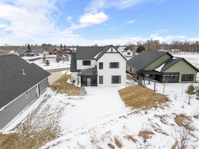 view of snow covered house