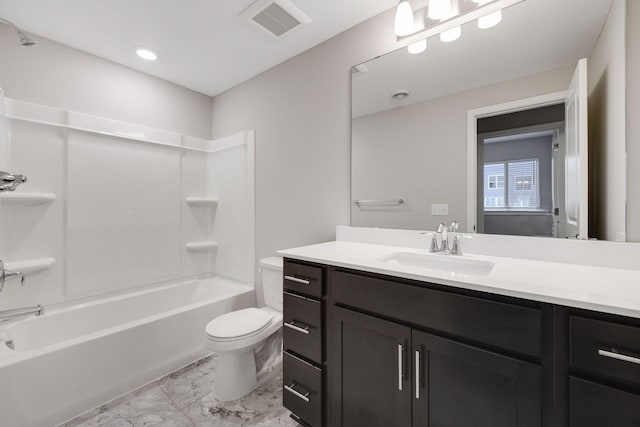 bathroom with visible vents, toilet, marble finish floor, vanity, and washtub / shower combination