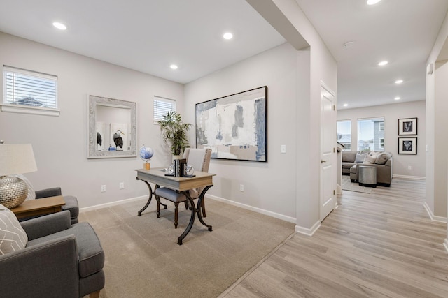 office area featuring recessed lighting, light wood finished floors, and baseboards