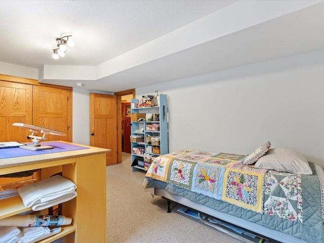 bedroom with light colored carpet