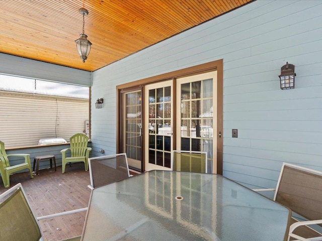 sunroom / solarium with wood ceiling