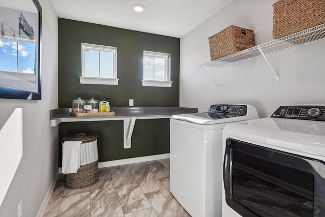 laundry area with washer and dryer