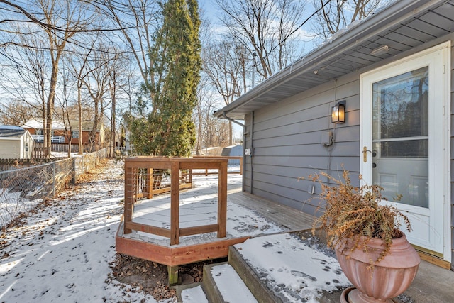 view of snow covered deck