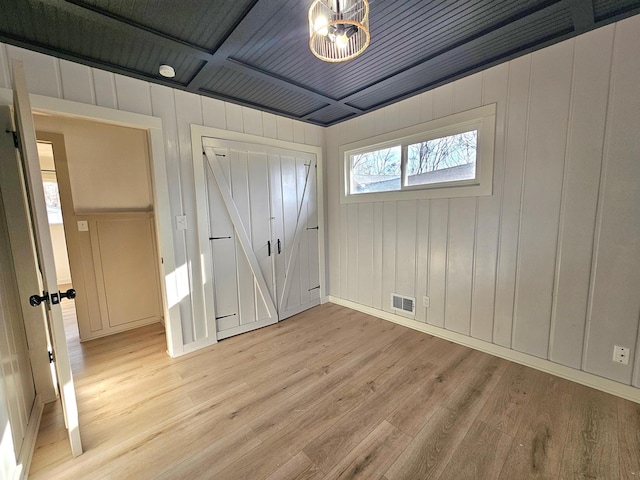 unfurnished bedroom featuring light hardwood / wood-style floors