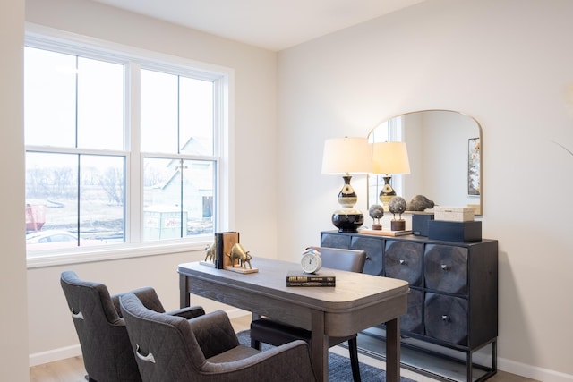 office featuring wood finished floors and baseboards