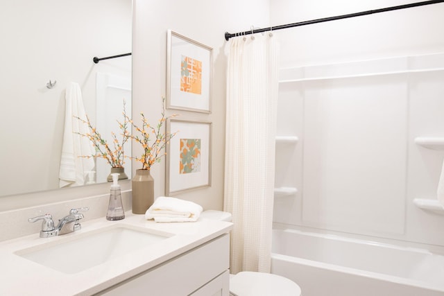 full bathroom with shower / bath combo, vanity, and toilet