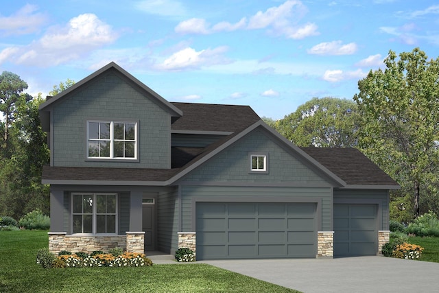 view of front of home with a garage and a front yard