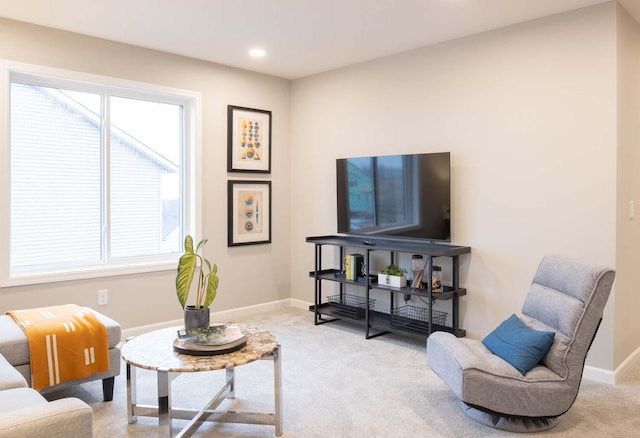 living area with baseboards, carpet flooring, and recessed lighting