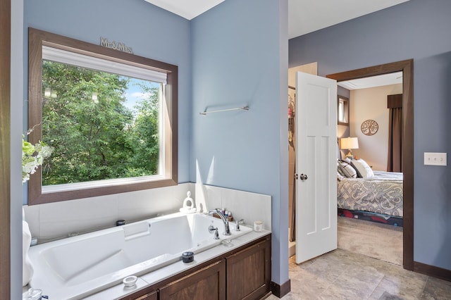 bathroom with a garden tub and ensuite bath