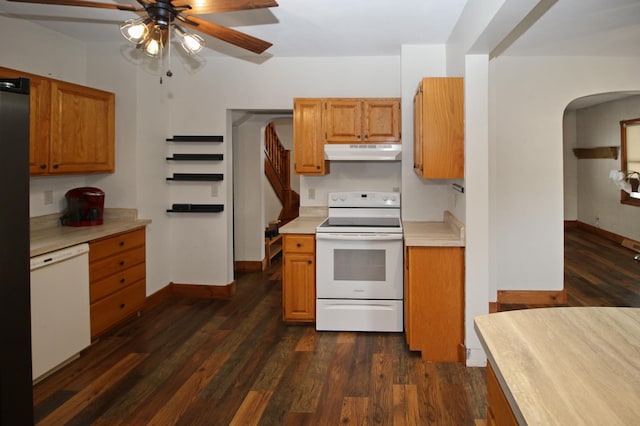 kitchen featuring ceiling fan, white appliances, and dark hardwood / wood-style floors