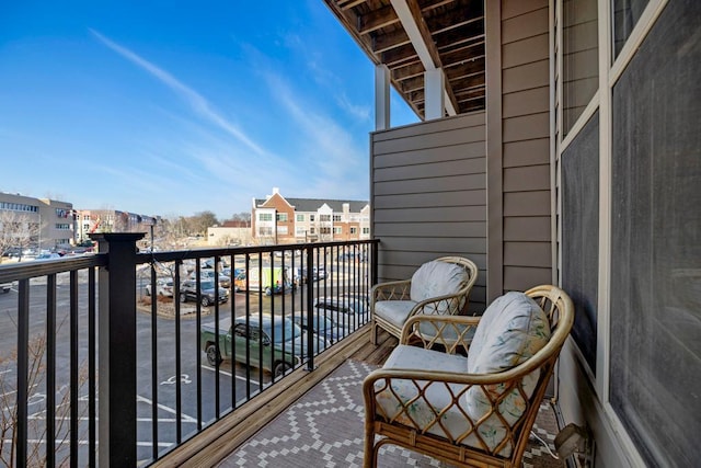 balcony featuring a residential view