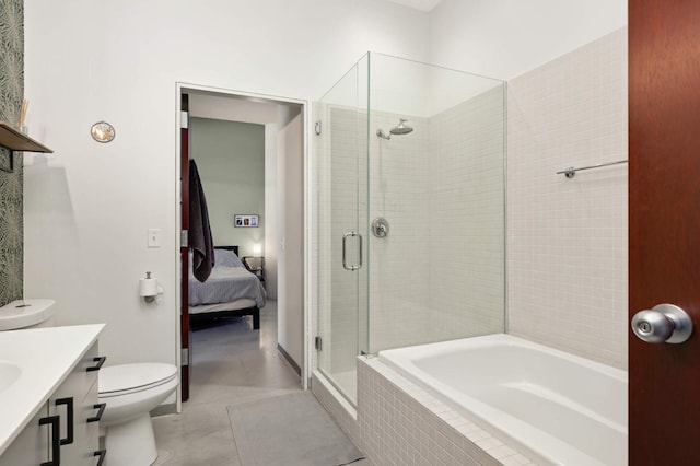 ensuite bathroom with a garden tub, toilet, a stall shower, vanity, and ensuite bath