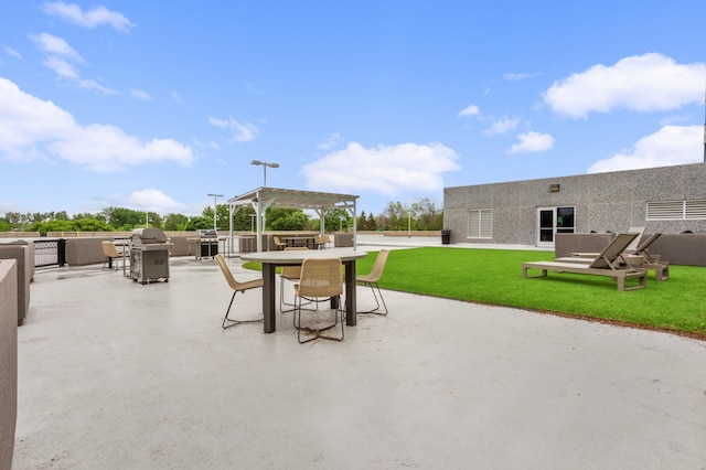 view of patio featuring outdoor dining area, a pergola, and area for grilling