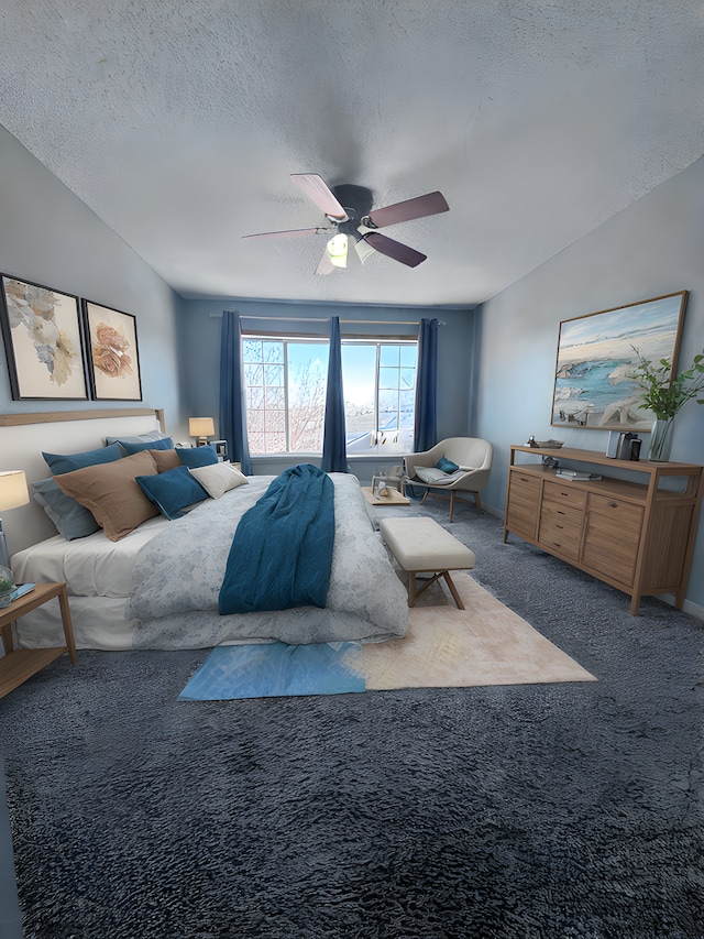 bedroom with ceiling fan, carpet floors, a textured ceiling, and vaulted ceiling