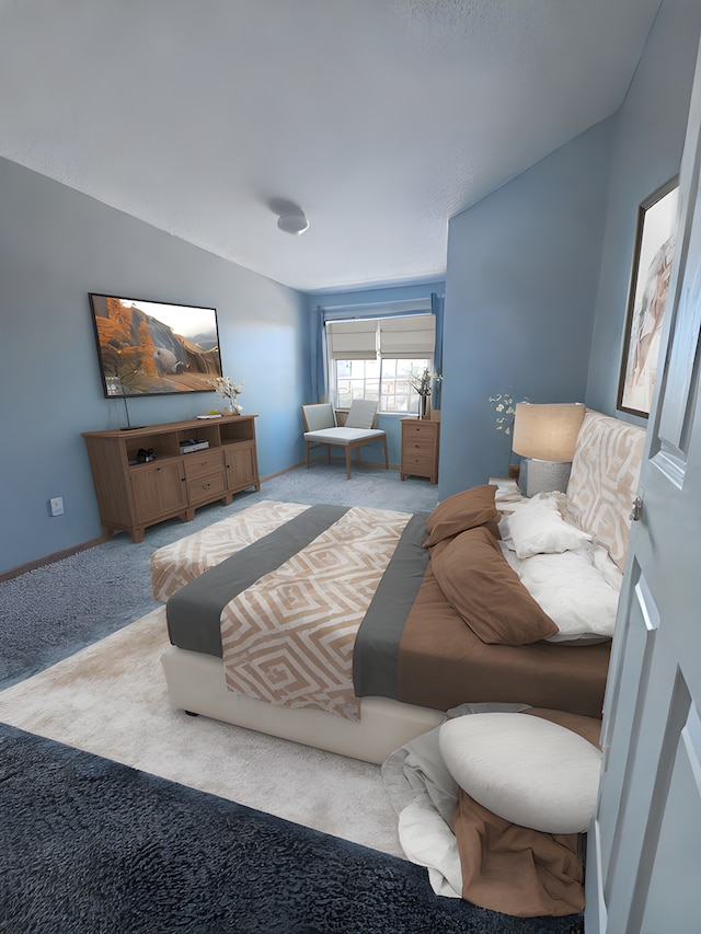 bedroom featuring lofted ceiling and light colored carpet