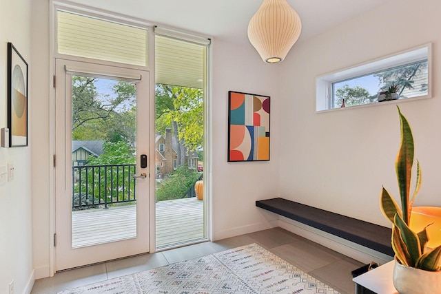 doorway featuring light tile patterned floors