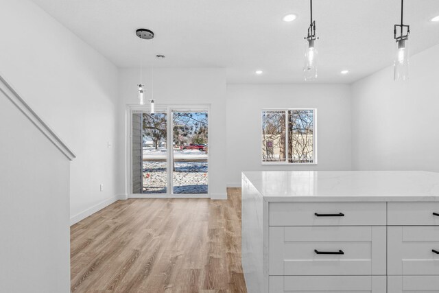 425 8th St Unit 23, New Richmond, WI 54017 - walk in closet featuring light wood-style flooring