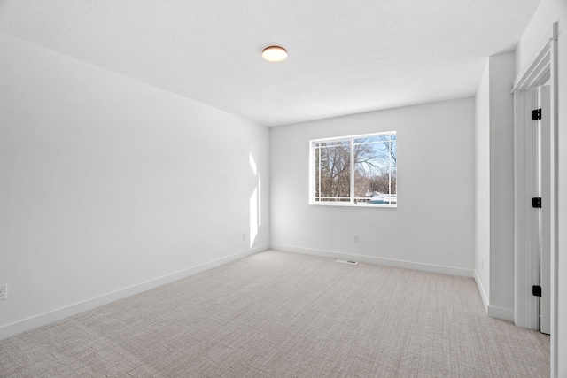 425 8th St Unit 23, New Richmond, WI 54017 - unfurnished bedroom with carpet and baseboards