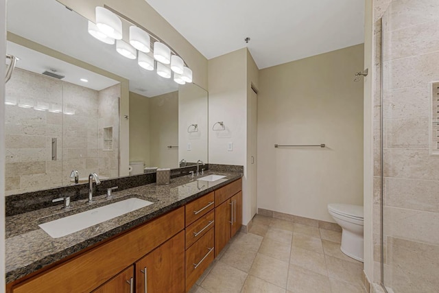 929 Portland Ave Unit 406, Minneapolis, MN 55404 - full bath with toilet, a stall shower, tile patterned flooring, and double vanity