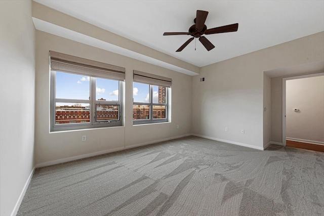 929 Portland Ave Unit 406, Minneapolis, MN 55404 - empty room with carpet flooring, a ceiling fan, and baseboards