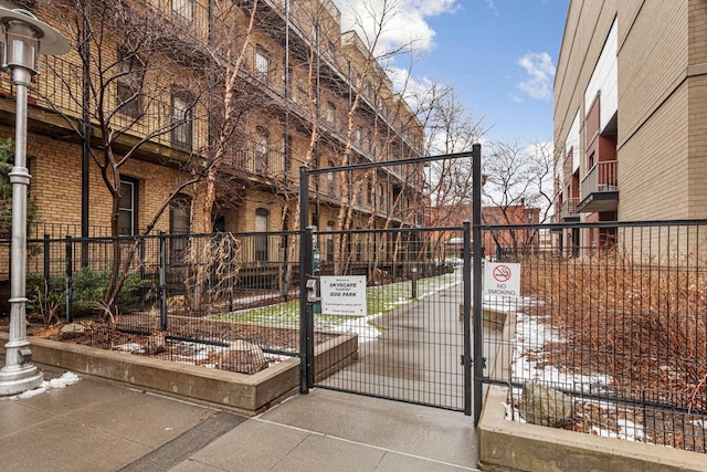 929 Portland Ave Unit 406, Minneapolis, MN 55404 - view of community featuring a gate