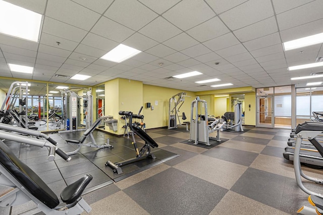 929 Portland Ave Unit 406, Minneapolis, MN 55404 - gym featuring a drop ceiling and baseboards