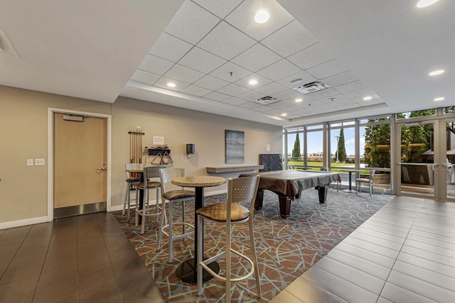 929 Portland Ave Unit 406, Minneapolis, MN 55404 - game room with baseboards, recessed lighting, billiards table, dark tile patterned floors, and a tray ceiling