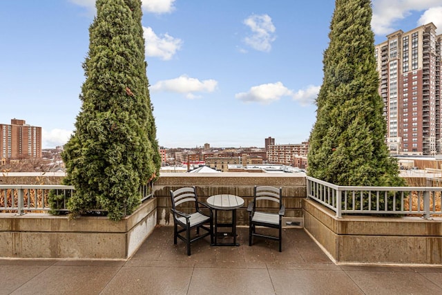 929 Portland Ave Unit 406, Minneapolis, MN 55404 - view of patio with a view of city and a balcony