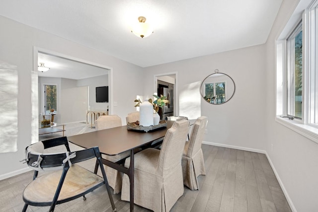 dining room with light wood-type flooring